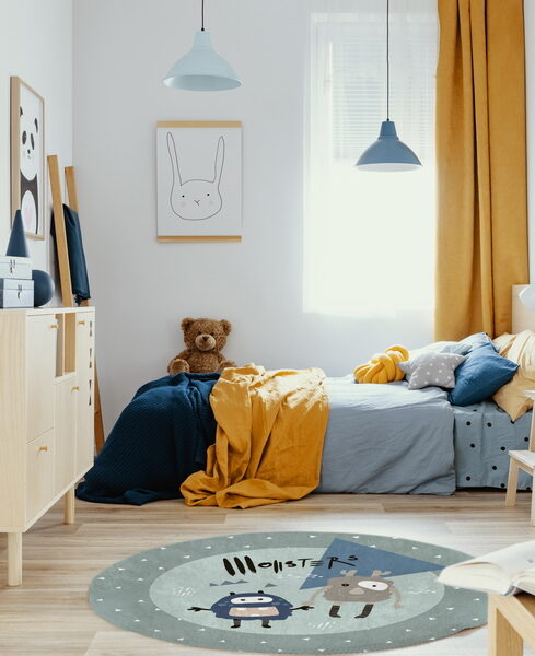 Teddy bear on single wooden bed in blue and orange bedroom inter